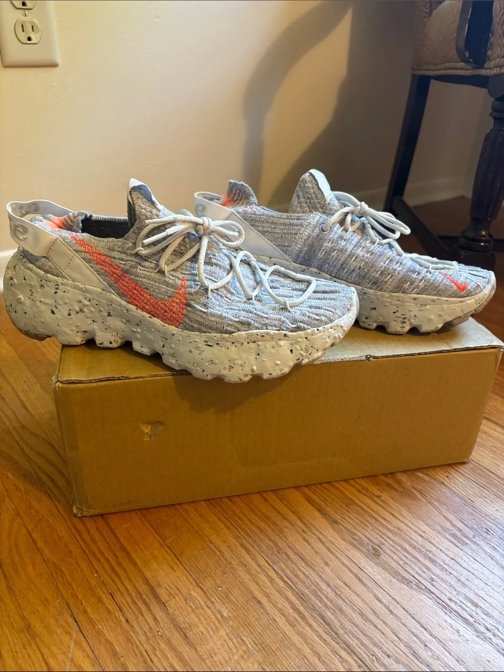 Nike Gray Flyknit Athletic Shoes with Orange Swoosh